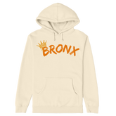 Beige hoodie with 'Bronx' and crown graphic on a white background